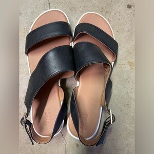 find by Amazon. women’s Asymmetric Cork Sole Leather Sandals. Size 6.